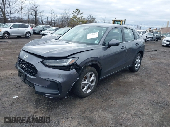 2024 Honda HR-V LX z VIN 3CZRZ2H36RM703890, wystawiony jako IAAI lot #41737489 z przebiegiem 21 789 mil mil oraz . Historia ofert i sprzedaży dostępna na DreamBid. Obrazek 2.