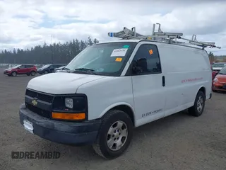 2013 Chevrolet Express Cargo Van with VIN 1GCSGAFX0D1111985, listed as a IAAI auction lot 42065556 with 243,671 mi miles. Bid and sale history available at carsss.com. Image 2.