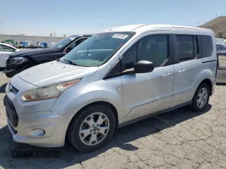 2014 Ford Transit Connect XLT z VIN NM0AE8F75E1150273, wystawiony jako Copart lot #59010195 z przebiegiem 173 295 mil mil oraz Czysty tytuł • Clean title. Historia ofert i sprzedaży dostępna na DreamBid. Obrazek 1.