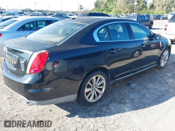 2009 Lincoln MKS with VIN 1LNHM94RX9G607947, listed as a IAAI auction lot 41644221 with 184,979 mi miles. Bid and sale history available at carsss.com. Image 4.