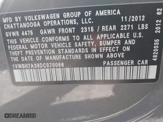2013 Volkswagen Passat SE w/Sunroof with VIN 1VWBH7A39DC070066, listed as a IAAI auction lot 41956865 with 186,414 mi miles. Bid and sale history available at carsss.com. Image 9.