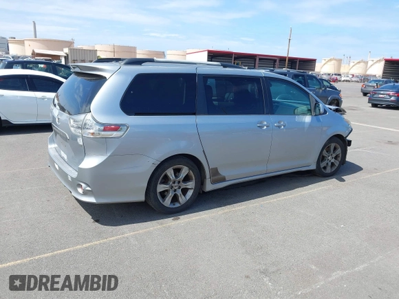 2011 Toyota Sienna SE with VIN 5TDXK3DC5BS062055, listed as a IAAI auction lot 42140951 with 141,539 mi miles and . Bid and sale history available at DreamBid. Image 4.