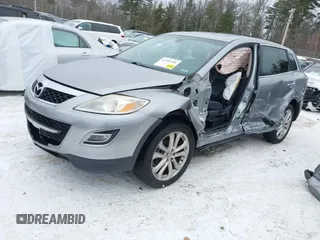 2012 Mazda CX-9 Grand Touring with VIN JM3TB3DV2C0353558, listed as a IAAI auction lot 41397266 with 158,843 mi miles and . Bid and sale history available at DreamBid. Image 2.