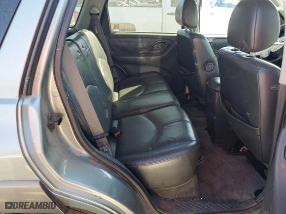 2004 Mazda Tribute ES with VIN 4F2CZ06114KM02980, listed as a Copart auction lot 77319964 with 178,922 mi miles and Salvage Title. Bid and sale history available at carsss.com. Image 10.
