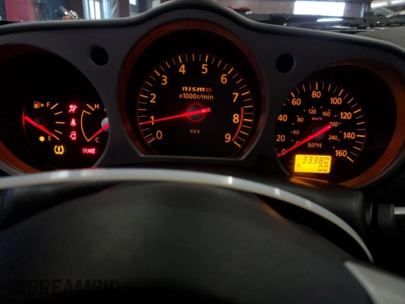 2008 Nissan 350Z Touring z VIN JN1BZ34EX8M751913, wystawiony jako Copart lot #86849544 z przebiegiem 33 380 mil mil oraz Szkoda całkowita • Salvage title. Historia ofert i sprzedaży dostępna na DreamBid. Obrazek 9.
