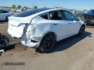 2022 Tesla Model Y Long Range with VIN 7SAYGDEE1NF364241, listed as a IAAI auction lot 42190272 with 54,878 mi miles and . Bid and sale history available at DreamBid. Image 4.