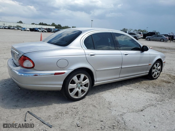 2005 Jaguar X-Type 3.0L with VIN SAJWA51C75WE23809, listed as a Copart auction lot 68457634 with 161,422 mi miles and Non Repairable. Bid and sale history available at carsss.com. Image 3.