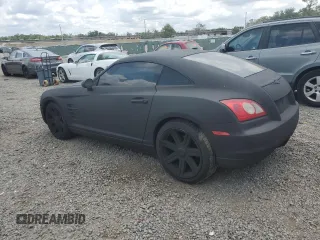 2004 Chrysler Crossfire z VIN 1C3AN69L84X014803, wystawiony jako Copart lot #56139015 z przebiegiem 102 523 mil mil oraz Szkoda całkowita • Salvage title. Historia ofert i sprzedaży dostępna na DreamBid. Obrazek 2.