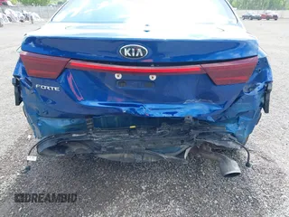 2019 Kia Forte LXS z VIN 3KPF24AD0KE135616, wystawiony jako IAAI lot #42277938 z przebiegiem 71 995 mil mil oraz . Historia ofert i sprzedaży dostępna na DreamBid. Obrazek 6.