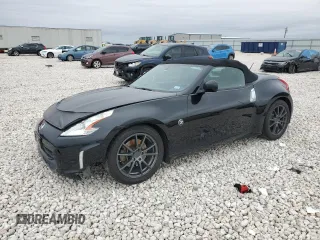 2014 Nissan 370Z Touring with VIN JN1AZ4FH1EM620177, listed as a Copart auction lot 42581255 with 106,957 mi miles and Salvage Title. Bid and sale history available at DreamBid. Image 1.