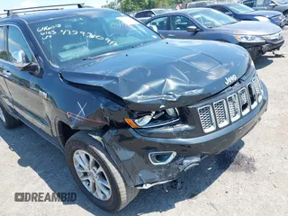 2014 Jeep Grand Cherokee Limited with VIN 1C4RJFBTXEC140898, listed as a IAAI auction lot 42793097 with 159,542 mi miles and . Bid and sale history available at DreamBid. Image 6.