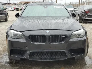 2013 BMW M5 z VIN WBSFV9C56DD096294, wystawiony jako Copart lot #57855005 z przebiegiem Nie podano mil oraz Tytuł czysty. Historia ofert i sprzedaży dostępna na DreamBid. Obrazek 5.