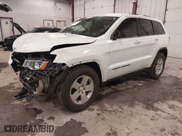 2017 Jeep Grand Cherokee Laredo with VIN 1C4RJEAG9HC854492, listed as a IAAI auction lot 41184619 with 134,839 mi miles. Bid and sale history available at carsss.com. Image 17.