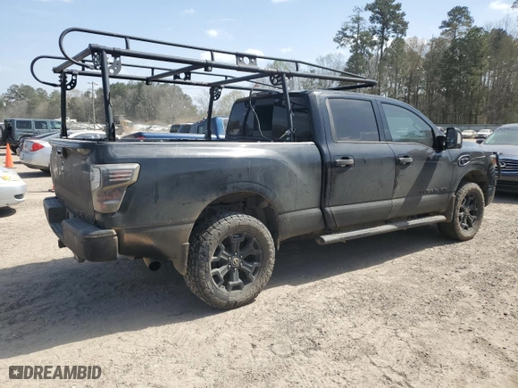 2018 Nissan Titan XD SV with VIN 1N6BA1F41JN517296, listed as a Copart auction lot 49090835 with 210,589 mi miles and Clean Title. Bid and sale history available at carsss.com. Image 3.