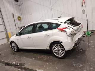 2014 Ford Focus Titanium with VIN 1FADP3N27EL110287, listed as a IAAI auction lot 42210697 with 107,741 mi miles and . Bid and sale history available at DreamBid. Image 14.