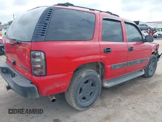 2004 Chevrolet Tahoe LS with VIN 1GNEC13Z54R214827, listed as a IAAI auction lot 42110221 with 227,560 mi miles and . Bid and sale history available at DreamBid. Image 4.