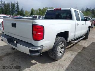 2017 Chevrolet Silverado 1500 LT with VIN 1GCVKREC7HZ131196, listed as a IAAI auction lot 42072336 with 158,140 mi miles. Bid and sale history available at carsss.com. Image 4.