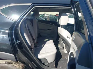 2021 Hyundai Tucson SE with VIN KM8J23A40MU334847, listed as a IAAI auction lot 41817556 with 63,000 mi miles and . Bid and sale history available at DreamBid. Image 8.