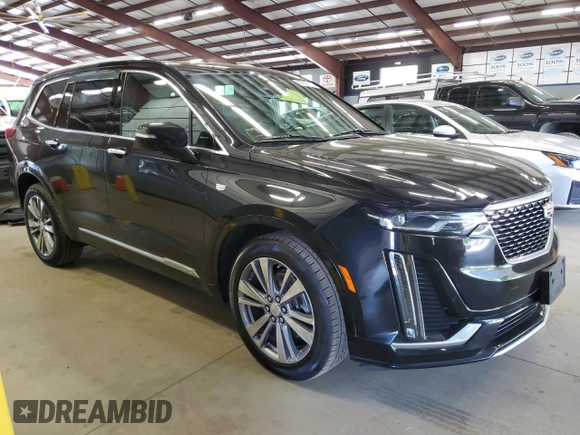 2020 Cadillac XT6 AWD Premium Luxury with VIN 1GYKPDRS1LZ112347, listed as a Copart auction lot 63209315 with 233,485 mi miles and Clean title. Bid and sale history available at DreamBid. Image 4.