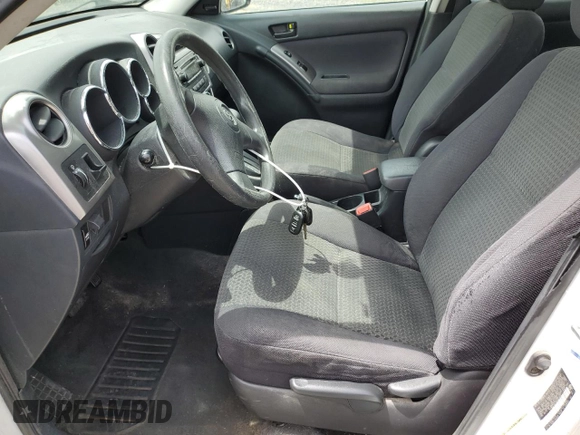 2006 Toyota Matrix STD z VIN 2T1KR32EX6C601035, wystawiony jako Copart lot #55938865 z przebiegiem 253 835 mil mil oraz Szkody całkowita. Historia ofert i sprzedaży dostępna na DreamBid. Obrazek 7.