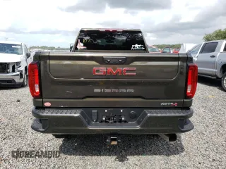 2023 GMC Sierra 3500HD AT4 z VIN 1GT49VEY3PF127108, wystawiony jako Copart lot #57052823 z przebiegiem 9915 mil mil oraz Szkody całkowita. Historia ofert i sprzedaży dostępna na DreamBid. Obrazek 6.