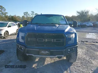 2020 Ford F-150 Raptor with VIN 1FTFW1RG6LFA91517, listed as a IAAI auction lot 41800990 with 112,535 mi miles and . Bid and sale history available at carsss.com. Image 13.