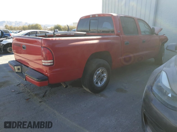 2000 Dodge Dakota Sport with VIN 1B7GL2AZ4YS722151, listed as a Copart auction lot 87870705 with 169,435 mi miles and Salvage Title. Bid and sale history available at DreamBid. Image 3.
