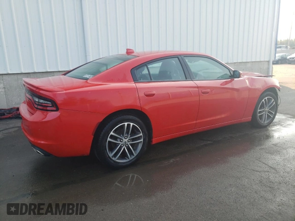 2019 Dodge Charger SXT with VIN 2C3CDXJGXKH611601, listed as a Copart auction lot 71523354 with 133,178 mi miles and Clean Title. Bid and sale history available at DreamBid. Image 3.