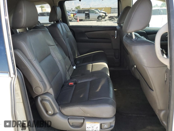 2016 Honda Odyssey Touring Elite with VIN 5FNRL5H9XGB006981, listed as a Copart auction lot 63970385 with 165,164 mi miles and Salvage title. Bid and sale history available at DreamBid. Image 11.
