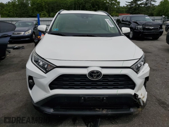 2019 Toyota RAV4 XLE with VIN JTMP1RFV6KD518001, listed as a Copart auction lot 58648895 with 44,309 mi miles and Salvage title. Bid and sale history available at DreamBid. Image 5.