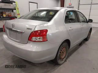 2009 Toyota Yaris with VIN JTDBT903391338448, listed as a IAAI auction lot 41583457 with 182,346 mi miles. Bid and sale history available at carsss.com. Image 4.