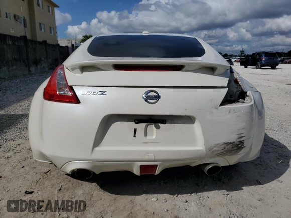 2014 Nissan 370Z Touring with VIN JN1AZ4EH6EM630690, listed as a Copart auction lot 43939795 with 66,797 mi miles and Salvage Title. Bid and sale history available at carsss.com. Image 6.