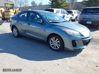 2012 Mazda Mazda3 i Touring with VIN JM1BL1V82C1689297, listed as a IAAI auction lot 42015725 with 49,598 mi miles. Bid and sale history available at carsss.com. Image 1.
