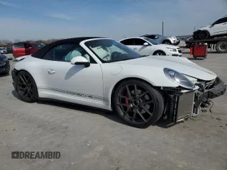 2015 Porsche 911 Carrera S with VIN WP0CB2A95FS154734, listed as a Copart auction lot 45084485 with 28,801 mi miles and Salvage Title. Bid and sale history available at DreamBid. Image 4.