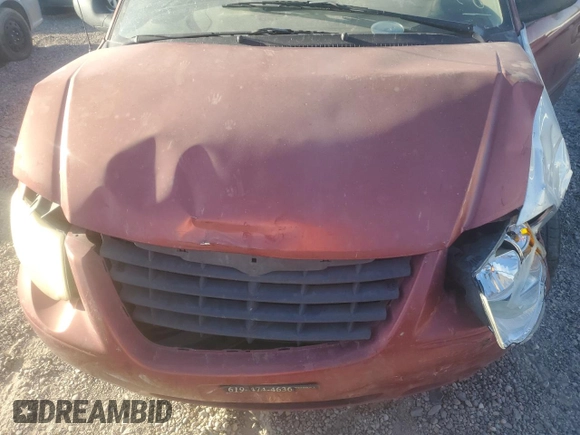 2007 Chrysler Town & Country Touring z VIN 2A8GP54L37R127233, wystawiony jako Copart lot #72338074 z przebiegiem Nie podano mil oraz Szkoda całkowita • Salvage title. Historia ofert i sprzedaży dostępna na DreamBid. Obrazek 12.