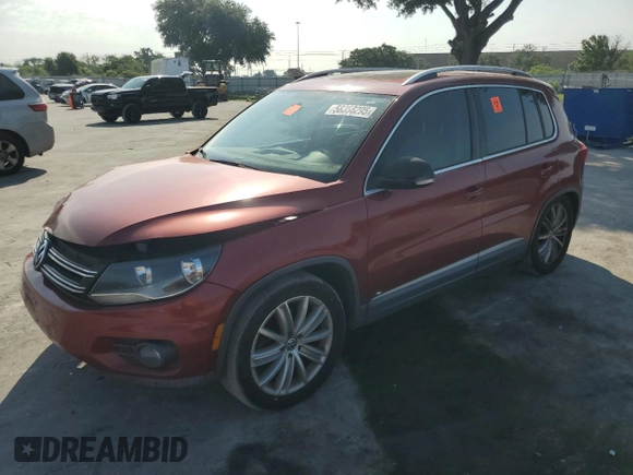 2012 Volkswagen Tiguan SE with VIN WVGAV7AX9CW003857, listed as a Copart auction lot 58356295 with 202,794 mi miles and Salvage title. Bid and sale history available at DreamBid. Image 1.