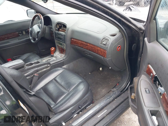 2002 Lincoln LS w/Base Pkg with VIN 1LNHM86S82Y701044, listed as a IAAI auction lot 41592614 with 192,902 mi miles. Bid and sale history available at carsss.com. Image 5.