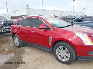 2014 Cadillac SRX Luxury Collection z VIN 3GYFNBE39ES576335, wystawiony jako IAAI lot #42093334 z przebiegiem 69 804 mil mil oraz . Historia ofert i sprzedaży dostępna na DreamBid. Obrazek 13.