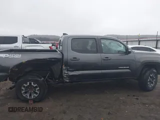 2022 Toyota Tacoma SR with VIN 3TMCZ5AN4NM476170, listed as a IAAI auction lot 41482149 with 57,126 mi miles and . Bid and sale history available at DreamBid. Image 13.