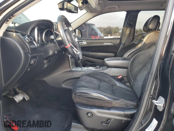 2012 Jeep Grand Cherokee SRT8 with VIN 1C4RJFDJ2CC329621, listed as a Copart auction lot 86772154 with 236,800 mi miles and Salvage Title. Bid and sale history available at carsss.com. Image 7.