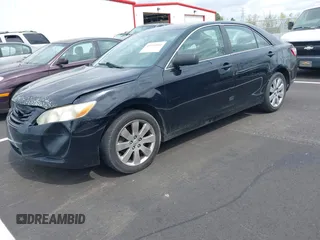 2007 Toyota Camry CE with VIN JTNBE46K473057431, listed as a IAAI auction lot 41941811 with 245,059 mi miles and . Bid and sale history available at DreamBid. Image 2.