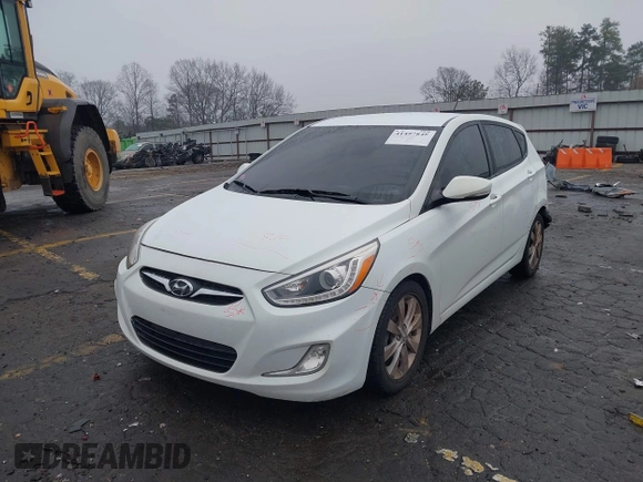 2014 Hyundai Accent SE with VIN KMHCU5AE8EU145629, listed as a IAAI auction lot 41497848 with 134,919 mi miles. Bid and sale history available at carsss.com. Image 2.