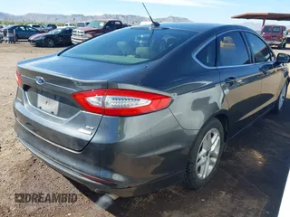 2015 Ford Fusion SE with VIN 3FA6P0HD2FR170310, listed as a IAAI auction lot 42123839 with 127,868 mi miles and . Bid and sale history available at DreamBid. Image 4.