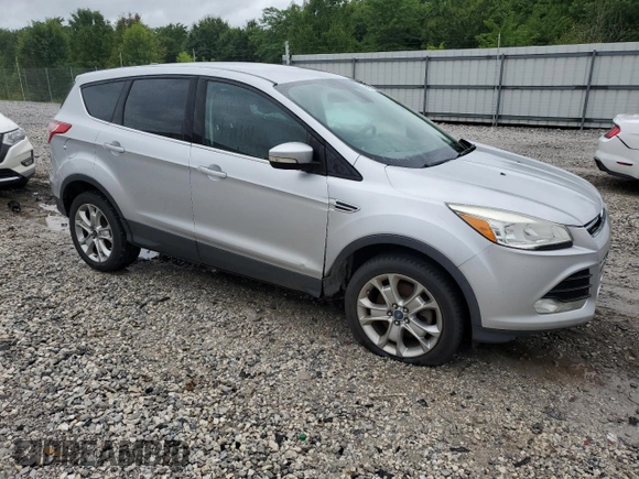 2013 Ford Escape SEL with VIN 1FMCU9HX1DUA60189, listed as a Copart auction lot 60937895 with 159,057 mi miles and Clean title. Bid and sale history available at DreamBid. Image 4.
