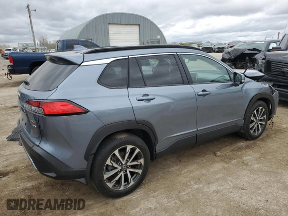 2023 Toyota Corolla Cross XLE with VIN 7MUDAABG1PV052040, listed as a Copart auction lot 51840315 with 43,228 mi miles and Salvage title. Bid and sale history available at DreamBid. Image 3.