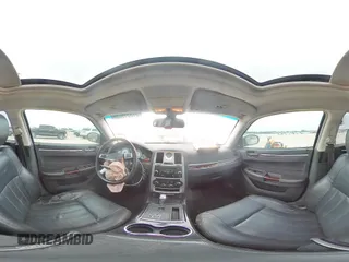 2008 Chrysler 300 C Hemi z VIN 2C3KA63HX8H281729, wystawiony jako Copart lot #51831955 z przebiegiem 217 551 mil mil oraz Szkoda całkowita • Salvage title. Historia ofert i sprzedaży dostępna na DreamBid. Obrazek 12.