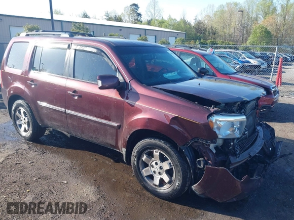 2011 Honda Pilot Touring z VIN 5FNYF4H9XBB040893, wystawiony jako IAAI lot #41933530 z przebiegiem 161 725 mil mil oraz . Historia ofert i sprzedaży dostępna na DreamBid. Obrazek 1.