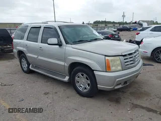 2006 Cadillac Escalade z VIN 1GYEK63N06R144513, wystawiony jako IAAI lot #41955578 z przebiegiem 202 964 mil mil oraz . Historia ofert i sprzedaży dostępna na DreamBid. Obrazek 1.