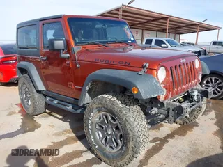 2014 Jeep Wrangler Rubicon with VIN 1C4BJWCG8EL185597, listed as a IAAI auction lot 41914489 with 85,545 mi miles and . Bid and sale history available at DreamBid. Image 1.