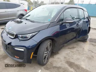 2019 BMW i3 z VIN WBY8P4C54K7E83372, wystawiony jako IAAI lot #42055886 z przebiegiem 22 230 mil mil oraz . Historia ofert i sprzedaży dostępna na DreamBid. Obrazek 2.